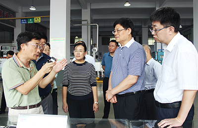 省政協教科衛體委員會副主任王世農一行來春光科技集團參觀調研